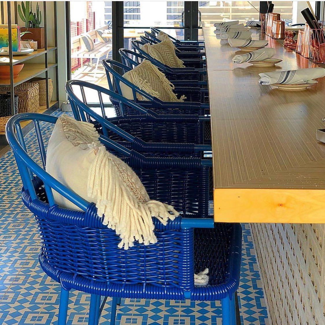 Comfortable blue bar stools at OSO Paseo in the Oklahoma Historic Paseo District.