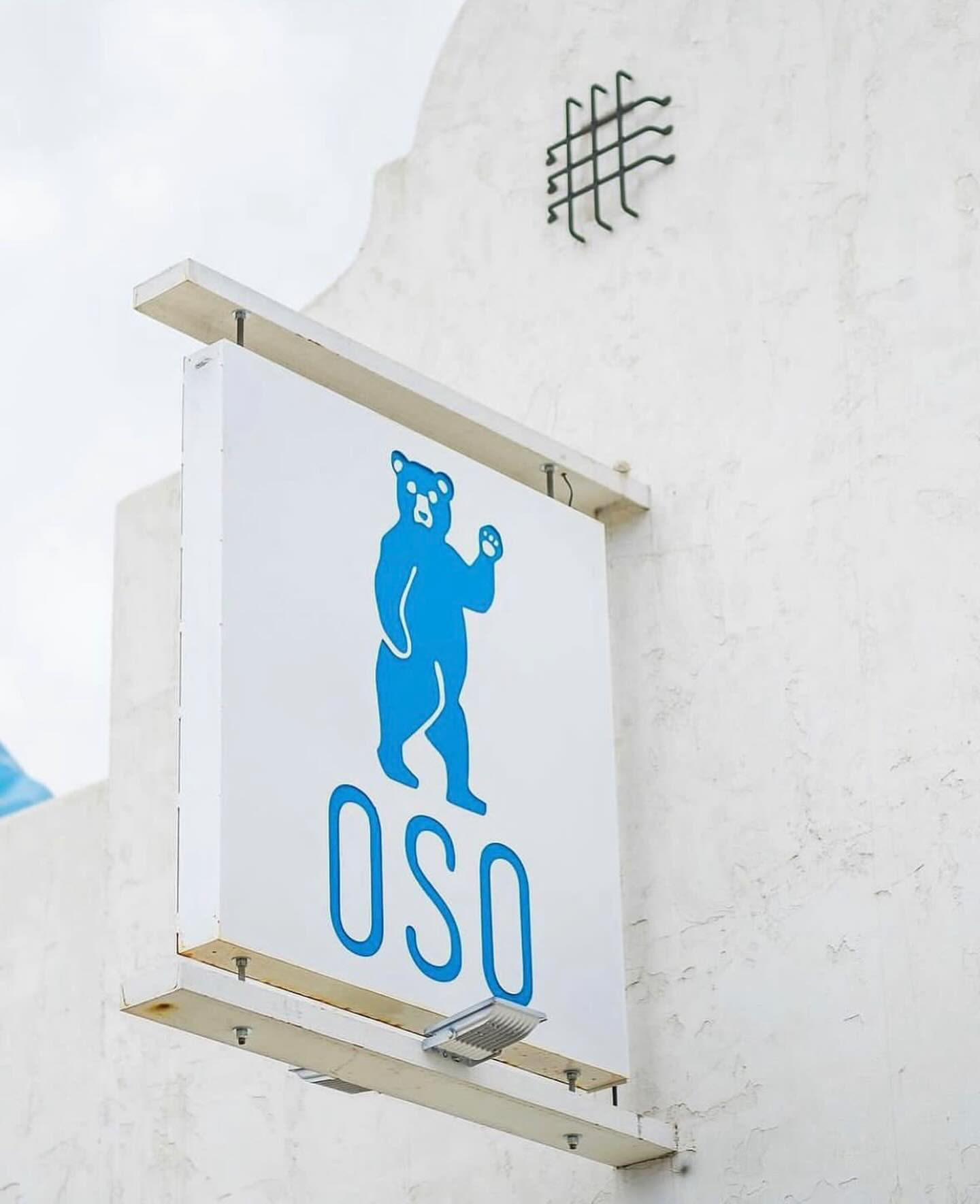 OSO Sign attached to OSO Paseo's building located in the Oklahoma Historic Paseo District.